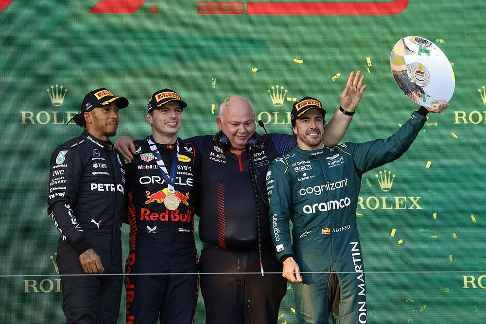 Lewis Hamilton, Mercedes-AMG2ns Max Verstappen, Red Bull Racing, 1st position, the Red Bull trophy delegate and Fernando Alonso, Aston Martin F1 Team, 3rd position, on the podium