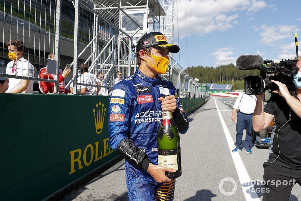 Lando Norris, McLaren celebrates with champagne 