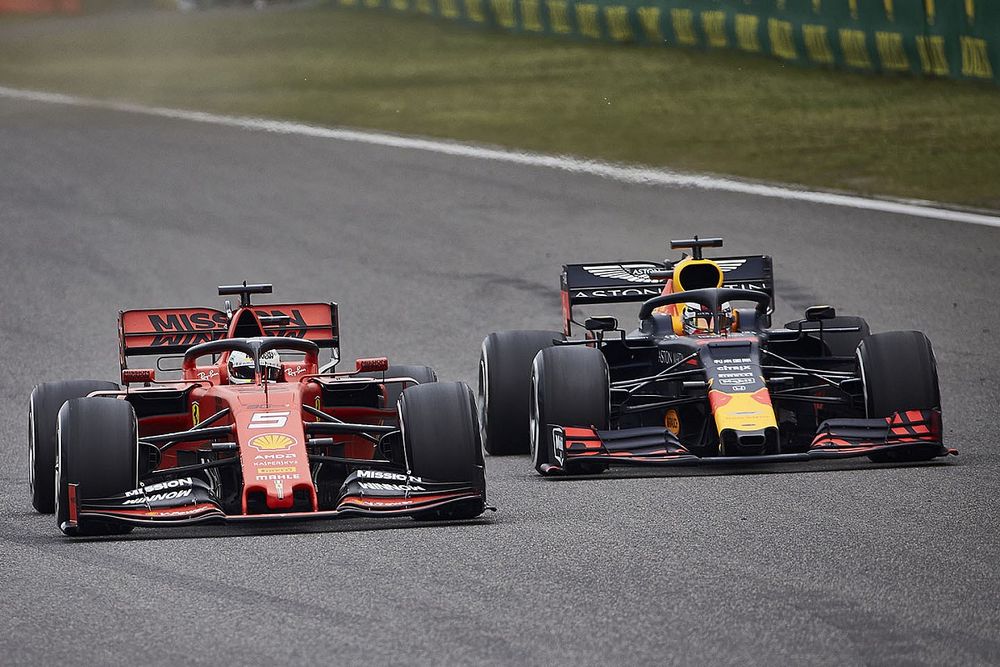 Sebastian Vettel, Ferrari SF90, battles with Max Verstappen, Red Bull Racing RB15