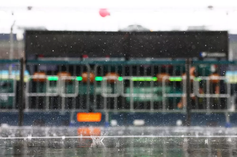 Rain falls in the Pitlane