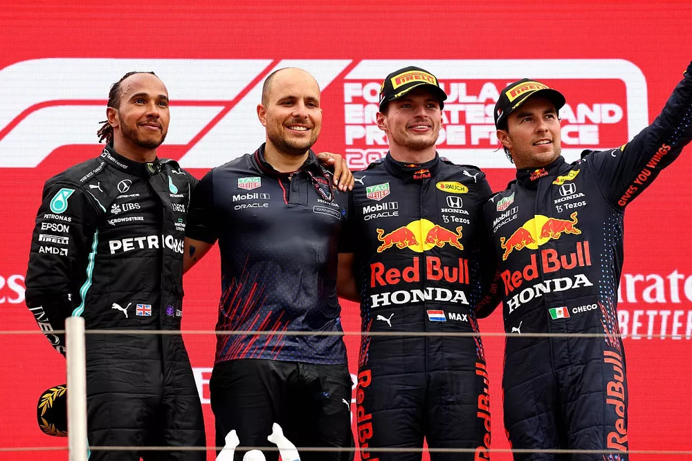 Sir Lewis Hamilton, Mercedes, 2nd position, Gianpiero Lambiase, Race Engineer, Red Bull Racing, Max Verstappen, Red Bull Racing, 1st position, and Sergio Perez, Red Bull Racing, 3rd position, on the podium