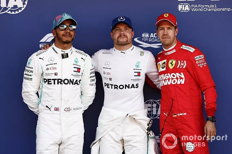Lewis Hamilton, Mercedes AMG F1, le poleman Valtteri Bottas, Mercedes AMG F1 et Sebastian Vettel, Ferrari sur le Parc Ferm&eacute;