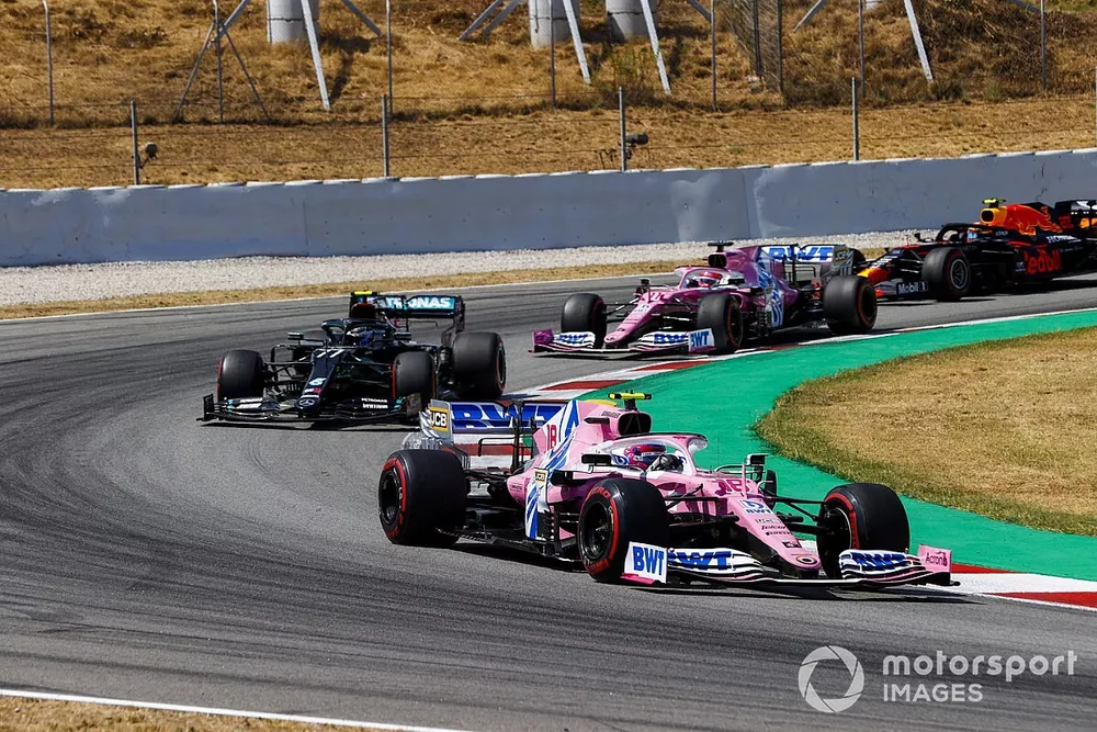 Lance Stroll, Racing Point RP20, leads Valtteri Bottas, Mercedes F1 W11 EQ Performance, Sergio Perez, Racing Point RP20, and Alex Albon, Red Bull Racing RB16