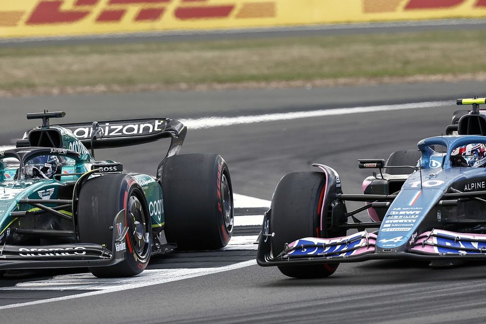 Lance Stroll, Aston Martin AMR23, battles with Pierre Gasly, Alpine A523