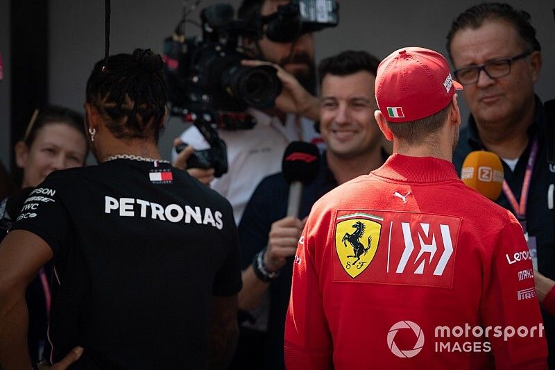 Lewis Hamilton, Mercedes AMG F1 y Sebastian Vettel, Ferrari 