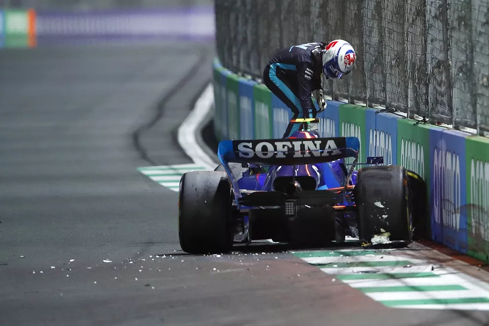 Nicholas Latifi, Williams FW44, climbs out of his car after crashing out of the race