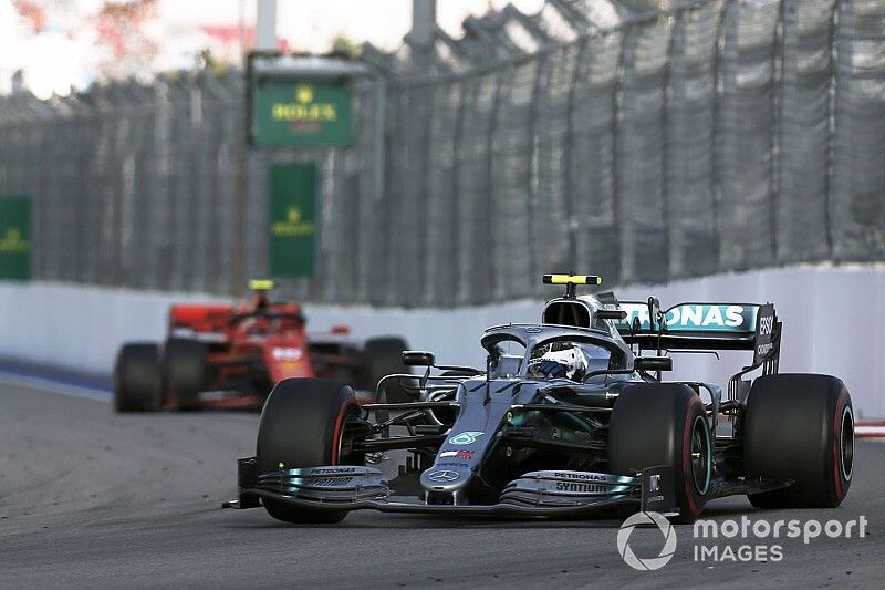 Valtteri Bottas, Mercedes AMG W10, leads Charles Leclerc, Ferrari SF90