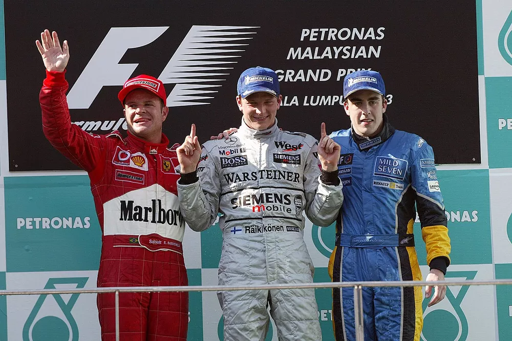 Podium : le vainqueur Kimi R&auml;ikk&ouml;nen, McLaren, deuxi&egrave;me place Rubens Barrichello, Ferrari, troisi&egrave;me place Fernando Alonso,	Renault