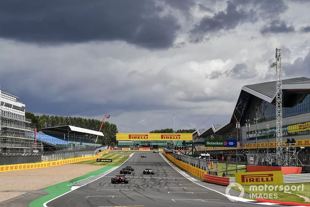 The drivers line up to practice their race start procedures at the end of the session
