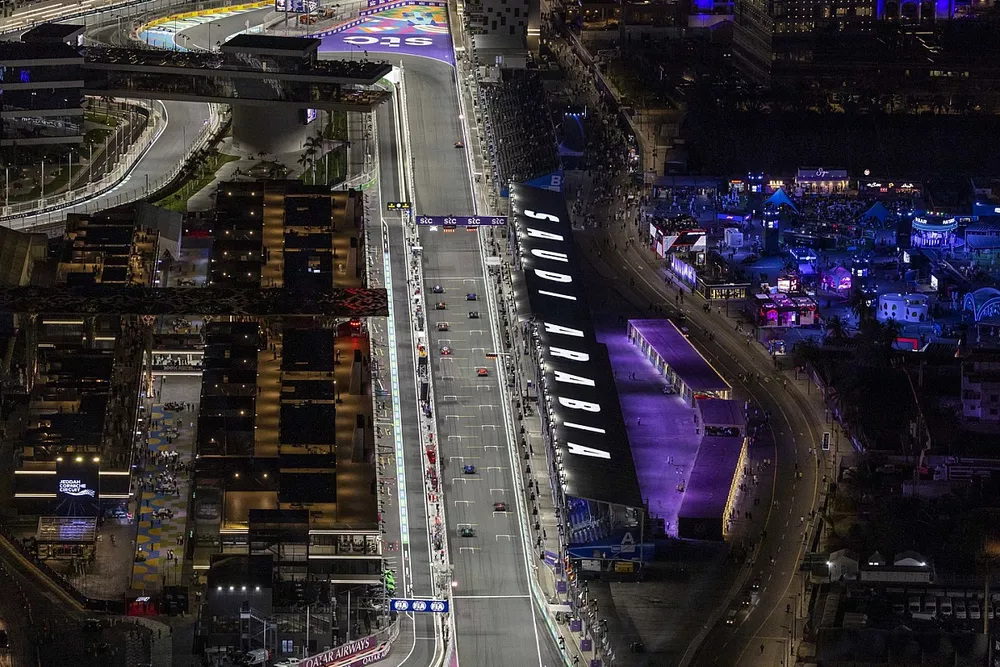 Drivers line up to practice their start procedures at the end of FP2