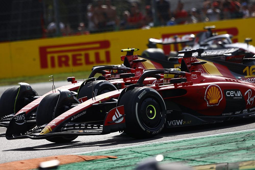 Charles Leclerc, Ferrari SF-23, battles with Carlos Sainz, Ferrari SF-23