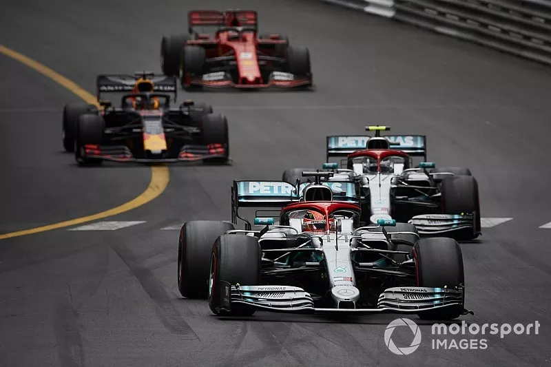 Lewis Hamilton, Mercedes AMG F1 W10, leads Valtteri Bottas, Mercedes AMG W10, Max Verstappen, Red Bull Racing RB15, and Sebastian Vettel, Ferrari SF90