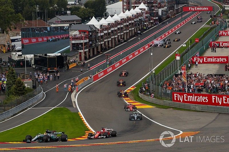 Lewis Hamilton, Mercedes-Benz F1 W08  leads at the start of the race as Esteban Ocon, Sahara Force India VJM10 and Sergio Perez, Sahara Force India VJM10 touch in the background