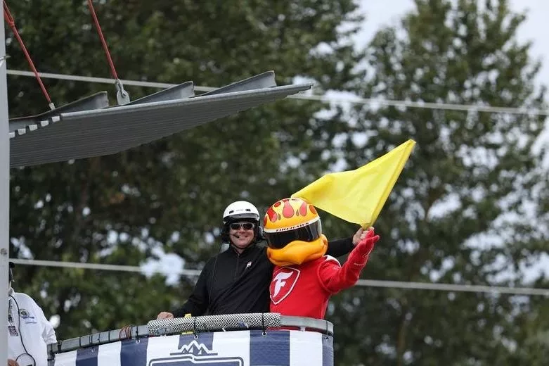 Aaron Likens waves the yellow flag with the Firestone Firehawk - Indy NXT By Firestone Grand Prix at Portland - By_ Matt Fraver_Ref Image Without Watermark_m116089