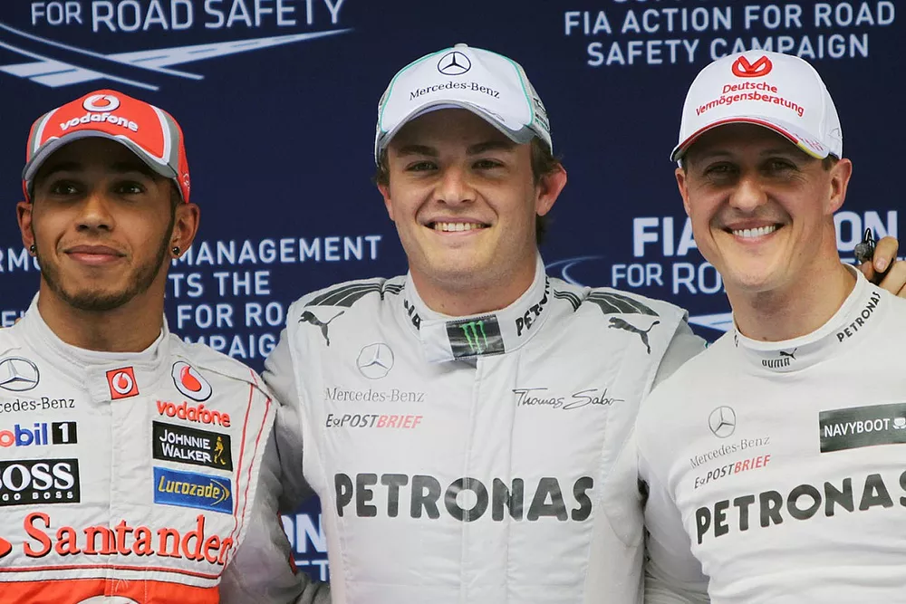 Pole sitter Nico Rosberg, Mercedes AMG F1, Lewis Hamilton, McLaren and Michael Schumacher, Mercedes 