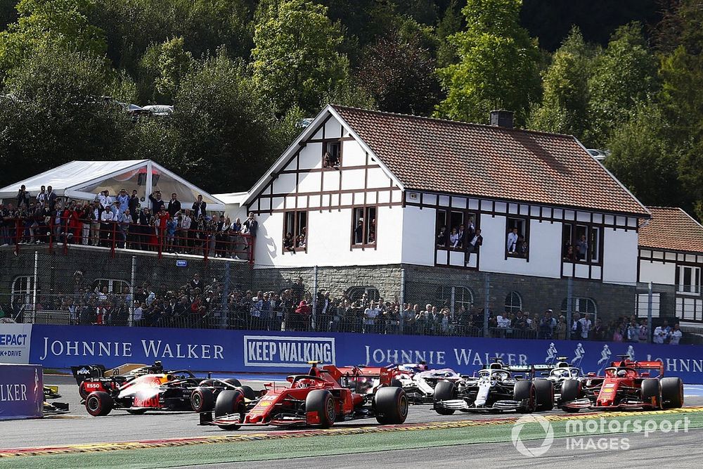 Charles Leclerc, Ferrari SF90, leads Sebastian Vettel, Ferrari SF90, Lewis Hamilton, Mercedes AMG F1 W10 and Valtteri Bottas, Mercedes AMG W10. Kimi Raikkonen, Alfa Romeo Racing C38 has just been tipped into the air by Max Verstappen, Red Bull Racing RB15 