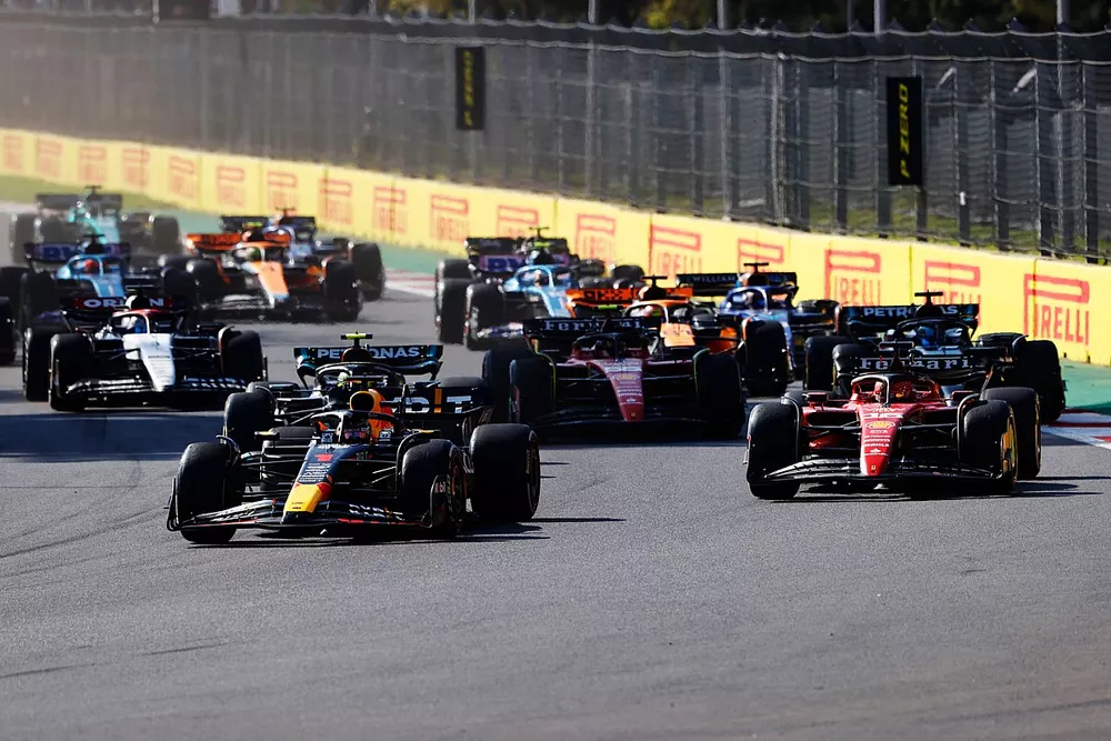 Max Verstappen, Red Bull Racing RB19, Charles Leclerc, Ferrari SF-23, Lewis Hamilton, Mercedes F1 W14, George Russell, Mercedes F1 W14, Carlos Sainz, Ferrari SF-23, Daniel Ricciardo, AlphaTauri AT04, the rest of the field at the restart