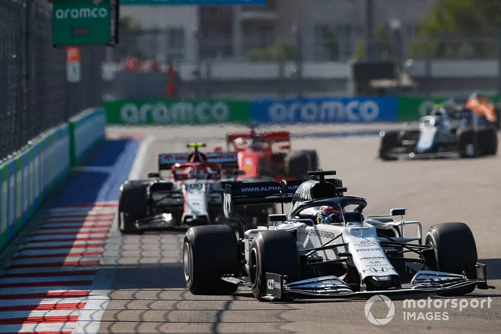 Daniil Kvyat, AlphaTauri AT01, Antonio Giovinazzi, Alfa Romeo Racing C39, and Sebastian Vettel, Ferrari SF1000