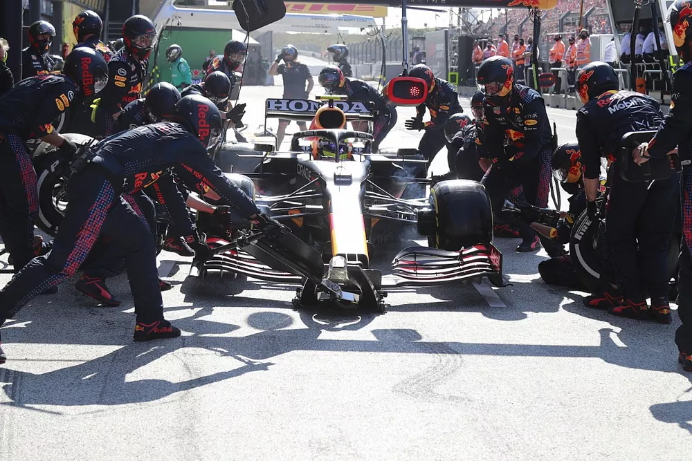 Sergio Perez, Red Bull Racing RB16B, in the pits