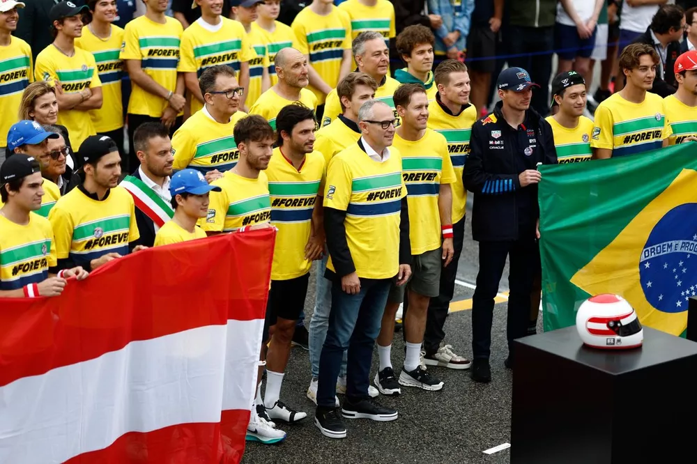 Lance Stroll, Aston Martin F1 Team, Esteban Ocon, Alpine F1 Team, Yuki Tsunoda, Visa Cash App RB F1 Team, Pierre Gasly, Alpine F1 Team, Carlos Sainz, Scuderia Ferrari, Stefano Domenicali, CEO, Formula One Group, Sebastian Vettel, Nico Hulkenberg, Haas F1 Team, Max Verstappen, Red Bull Racing, Zhou Guanyu, Stake F1 Team Kick Sauber, George Russell, Mercedes-AMG F1 Team, stand on the grid in memory of Ayrton Senna and Roland Ratzenberger