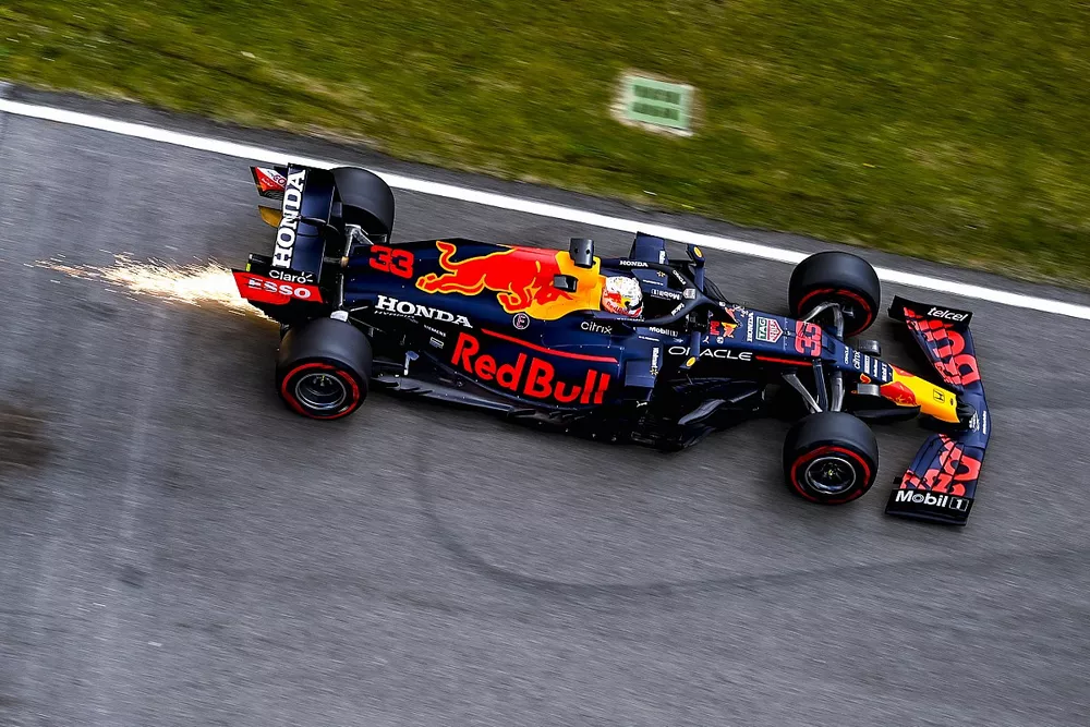 Sparks trail behind Max Verstappen, Red Bull Racing RB16B