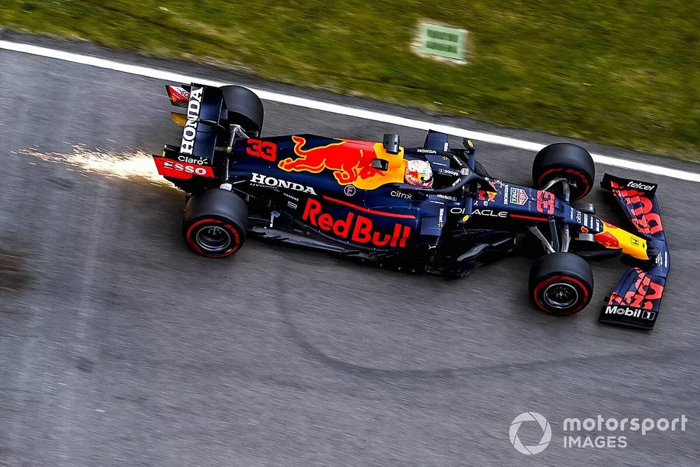 Sparks trail behind Max Verstappen, Red Bull Racing RB16B