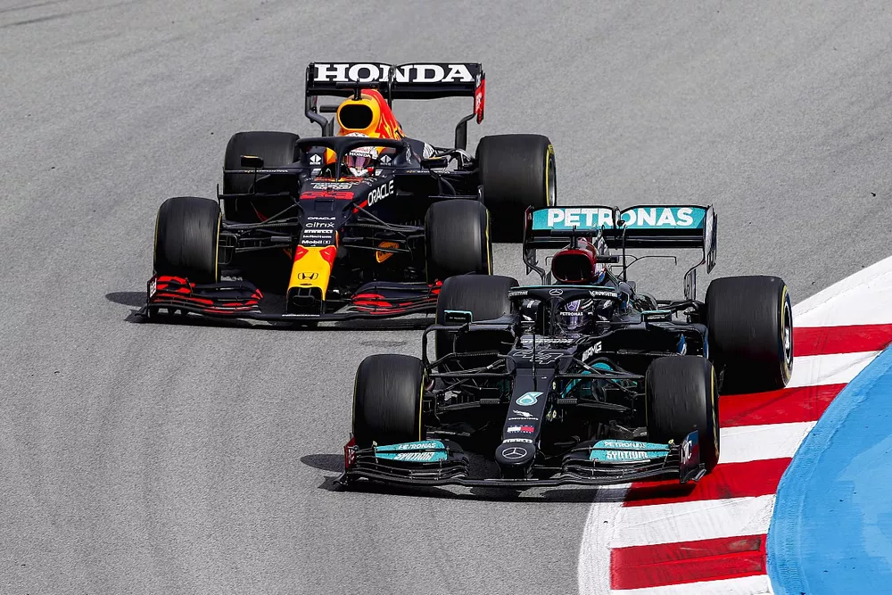 Lewis Hamilton, Mercedes W12 and Max Verstappen, Red Bull Racing RB16B battle