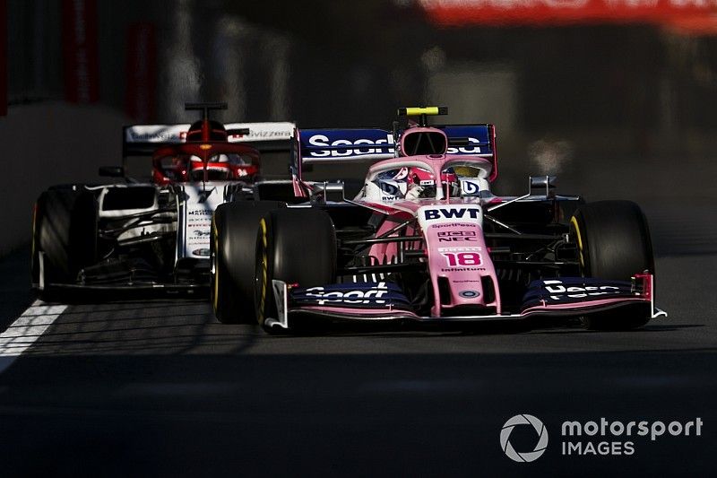 Lance Stroll, Racing Point RP19, leads Kimi Raikkonen, Alfa Romeo Racing C38