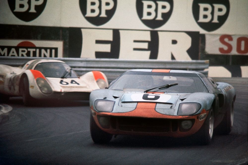 Le Mans, France. 14 - 15 June 1969
Jacky Ickx/Jackie Oliver (Ford GT40), 1st position, leads Hans Herrmann/Gerard Larrousse (Porsche 908), 2nd position, action. World Copyright: LAT Photographic
Ref:  69LM36.