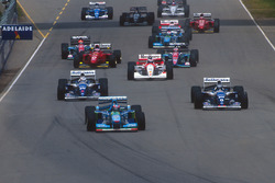 Michael Schumacher, Benetton B194 Ford leads Damon Hill and Nigel Mansell, Williams FW16B Renault