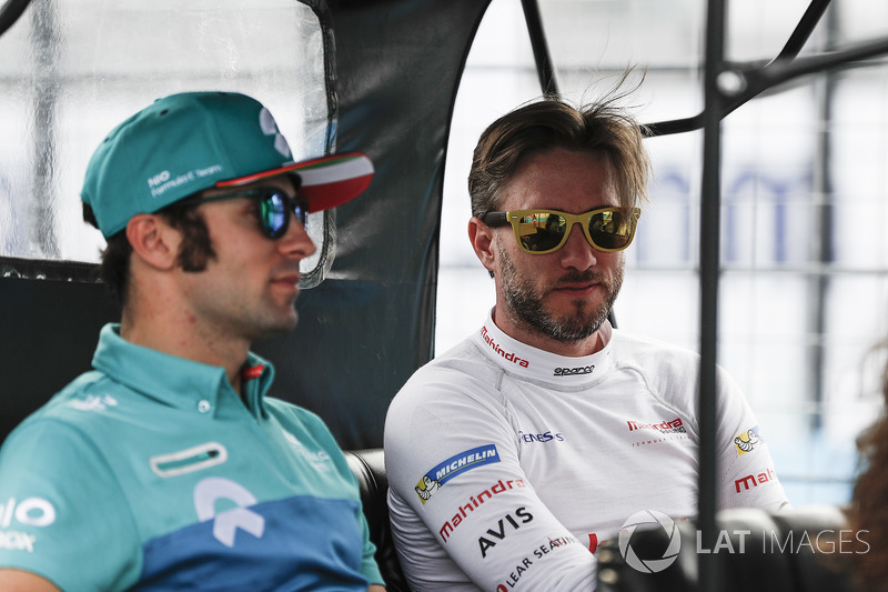 Luca Filippi, NIO Formula E Team, with Nick Heidfeld, Mahindra Racing