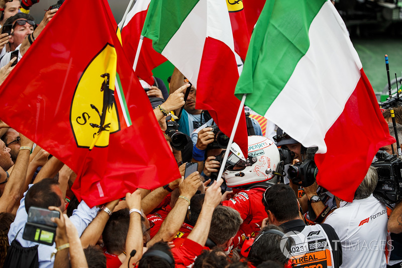 Sebastian Vettel, Ferrari, 1st position, celebrates in Parc Ferme with his team