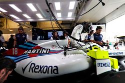 Lance Stroll, Williams Racing, climbs in to his car