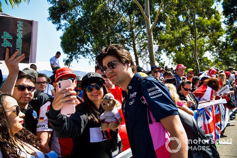 Lance Stroll, Racing Point poses for a selfie with a fan