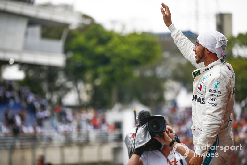 Lewis Hamilton, Mercedes AMG F1, celebrates victory in parc ferme.