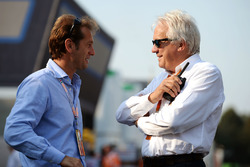 (L to R): Jarno Trulli, with Charlie Whiting, FIA Delegate