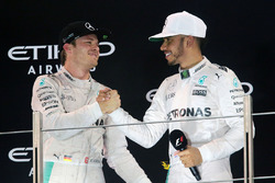 The podium: second place Nico Rosberg, Mercedes AMG F1 celebrates his World Championship with race winner and team mate Lewis Hamilton, Mercedes AMG F1