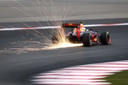 Max Verstappen, Red Bull Racing RB12 sends sparks flying