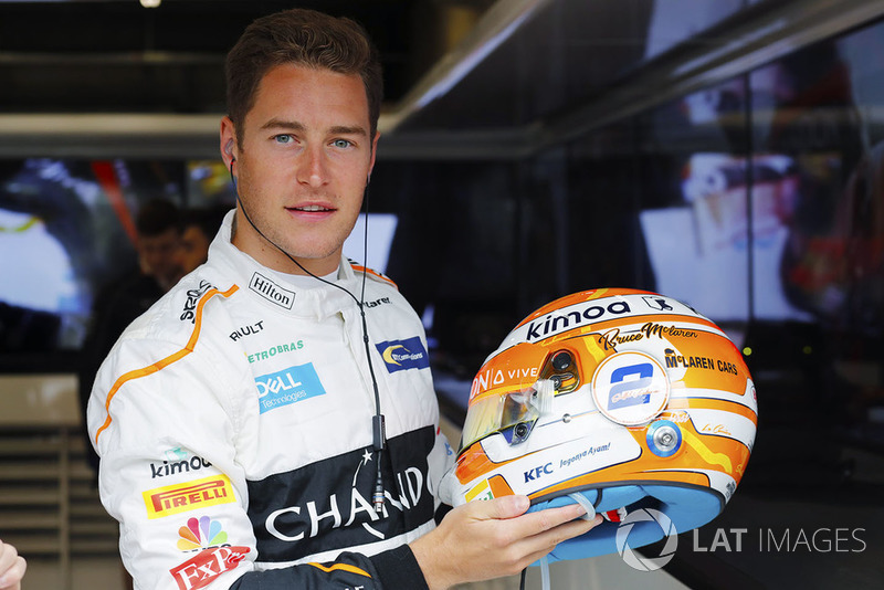 Stoffel Vandoorne, McLaren, shows off a new helmet design, with Bruce McLaren's name on it