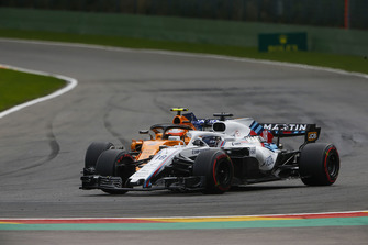 Lance Stroll, Williams FW41, passes Stoffel Vandoorne, McLaren MCL33