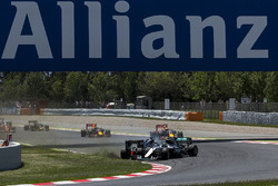 Lewis Hamilton, Mercedes AMG F1 W07 Hybrid and Nico Rosberg, Mercedes AMG F1 W07 Hybrid collide on the opening lap of the race
