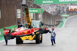 The Ferrari SF16-H of Kimi Raikkonen, Ferrari is removed from the circuit after he crashed out of the race