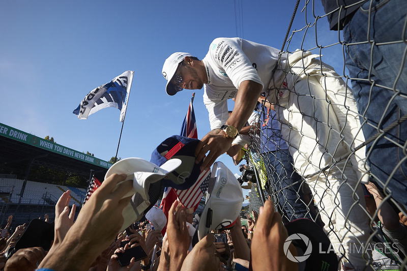 Lewis Hamilton, Mercedes AMG F1, signs autographs for fans