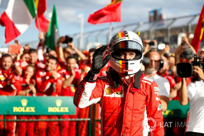 Sebastian Vettel, Ferrari, 1st position, celebrates with his team in Parc Ferme