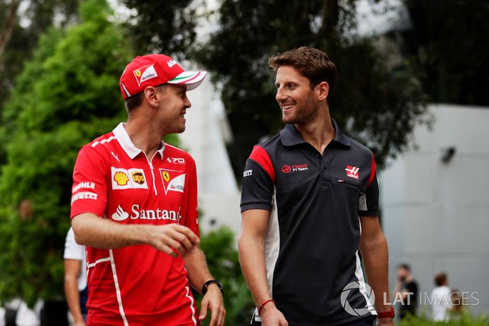 Sebastian Vettel, Ferrari, Romain Grosjean, Haas F1 Team