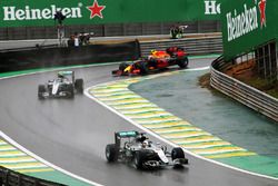 Lewis Hamilton, Mercedes AMG F1 W07 Hybrid leads team mate Nico Rosberg, Mercedes AMG F1 W07 Hybrid and Max Verstappen, Red Bull Racing RB12 out of the pits