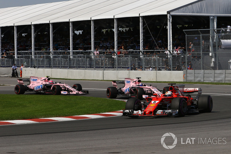 Sebastian Vettel, Ferrari SF70H leads Sergio Perez, Sahara Force India VJM10 and Esteban Ocon, Sahara Force India VJM10