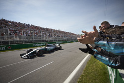 Lewis Hamilton, Mercedes AMG F1 W08, crosses the line for victory