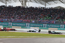 Lewis Hamilton, Mercedes AMG F1 W07 Hybrid leads at the start of the race as Nico Rosberg, Mercedes AMG F1 W07 Hybrid and Sebastian Vettel, Ferrari SF16-H collide