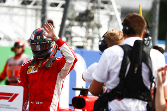 Polesitter Kimi Raikkonen, Ferrari celebrates